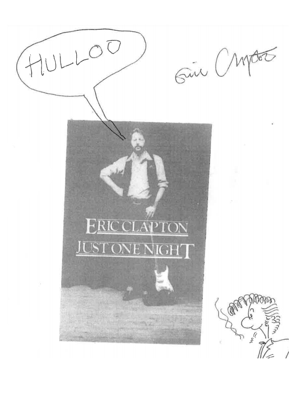 En bild på Eric Clapton med en pratbubbla som säger Hullu. Bilden är signerad av Eric Clapton.